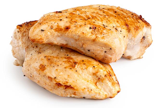 Grilled chicken breast on white isolated background