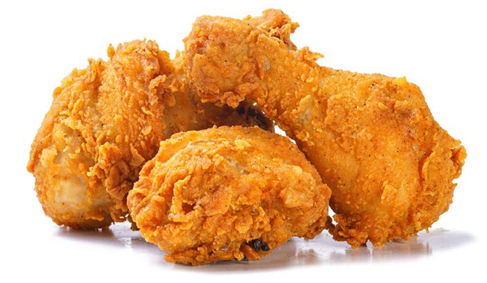 3 pieces of golden fried chicken on white isolated background