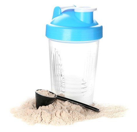 Protein powder bottle, with protein powder around the bottle, on a white isolated background